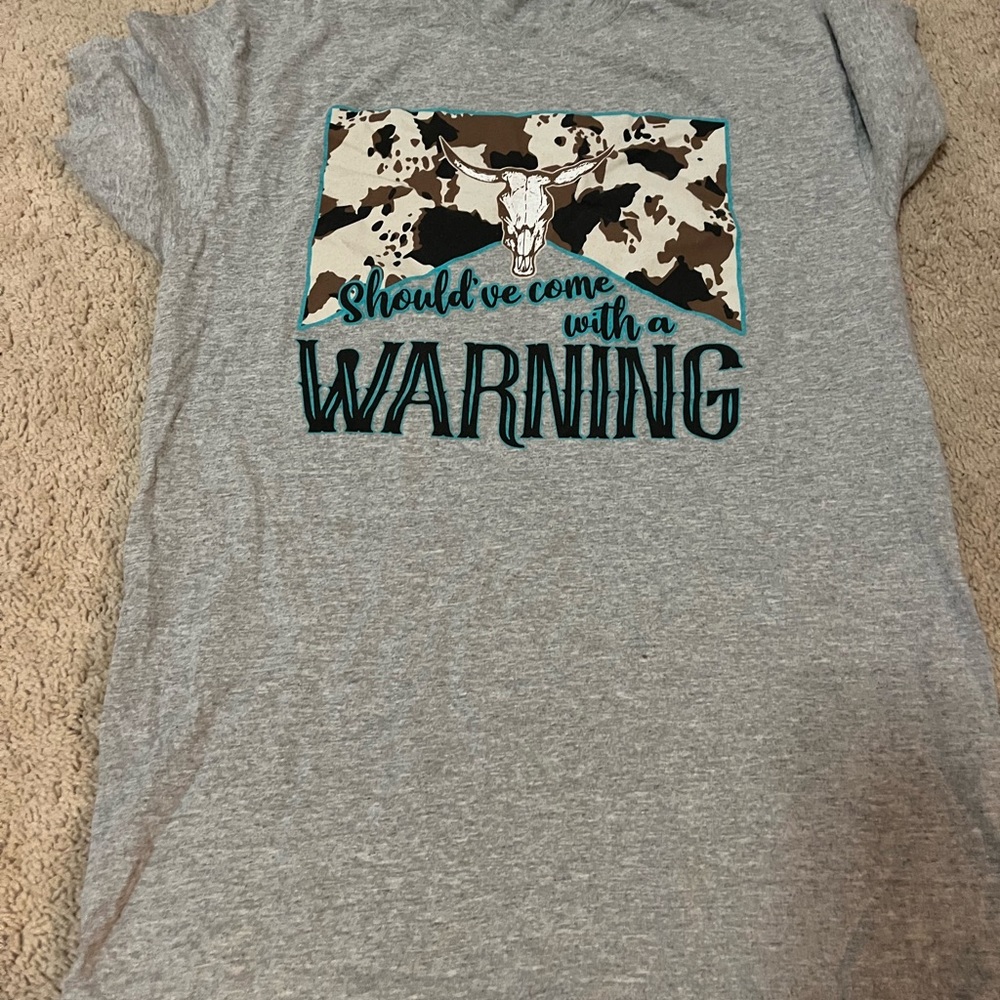 New without tags. Shouldve come with a warning